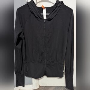 Black Lucy zip up jacket. Size Medium